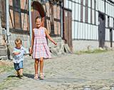 Cute brother and sister in city