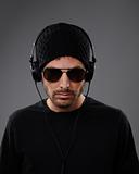 Serious DJ with headphones