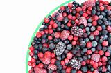 Frozen mixed fruit in bowl - berries - red currant, cranberry, raspberry, blackberry, bilberry, blueberry, black currant
