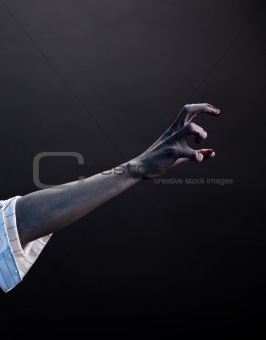 High contrast zombie hand, extreme body-art 