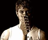 Young man with guitar portrait grunge punk rock