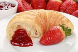 Croissant with strawberry marmalade