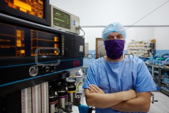 Portrait of surgeon looking at camera in clinic operation room