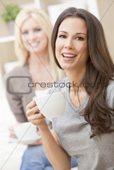 Happy Women Friends Drinking Tea or Coffee