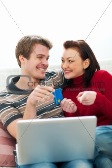 Young couple making online purchases