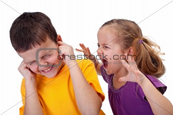 Kids quarrel - little girl shouting in anger