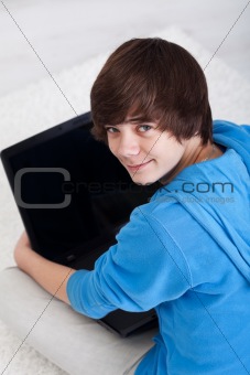 Young teenager with laptop