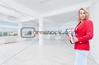 Real estate agent in large office space