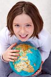 Young girl studying geography