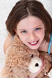 Young girl with teddy bear