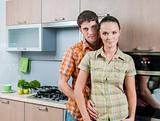 young couple at kitchen
