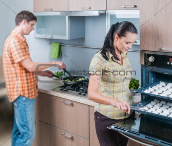 young couple at kitchen