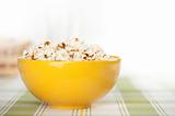 popcorn in a yellow bowl