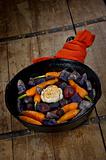 Prepared Root Vegetables in a Cast Iron Skillet