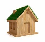 Wooden house with a green grass on a roof.
