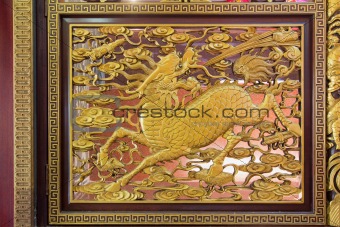 Wood Carved Qilin on Chinese Temple Wall