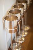 Champagne buckets in a row