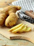 Fresh ginger root on a cutting board