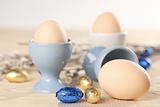 Eggs in white and blue eggcups