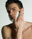 portrait of man with shaving foam