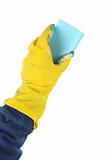 Hand in yellow glove with sponge