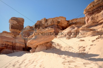 weathered orange rock in stone desert