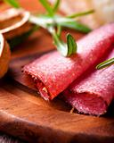 Closeup of spicy Salami with Rosemary