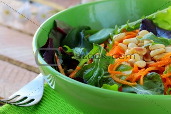 salad of fresh carrots with pine nuts