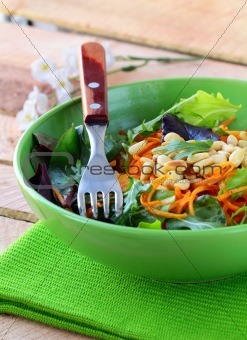salad of fresh carrots with pine nuts