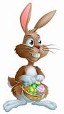 Easter bunny rabbit holding Easter eggs basket