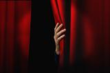Opening red curtain