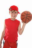 Happy child holding basketball