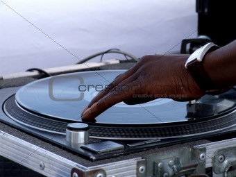 Male hand on a Record