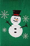 Snowman and Snowflakes on green background