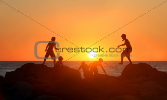 Boys playing on the beach