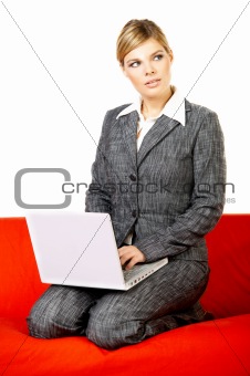 Woman on red couch