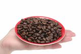 It is a lot of grains of coffee lay in hands