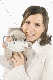 Young woman with stuffed animal