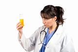 Female doctor examining test flasks