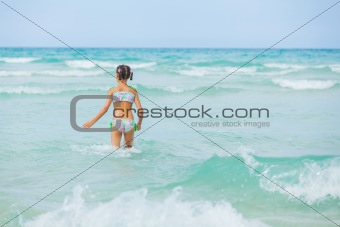 Adorable girl on the beach