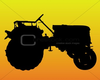 black silhouette of the wheel of the tractor