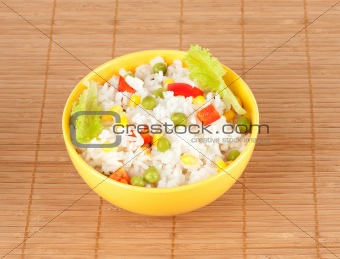 cooked rice in bowl with vegetables