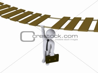Businessman hanging from a suspended bridge