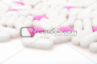 Pink Pills and White Capsule