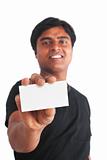 Young indian guy holding business card