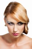 blond vintage girl portrait, she has an actractive eyes
