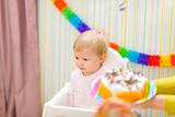 Upset baby on celebration of first birthday