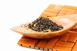 fragrant black tea in wooden spoon