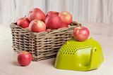 red apples in basket on the table