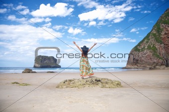 happy woman in Ballota beach